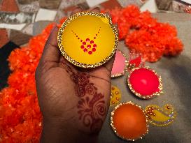 Decorating Clay Diwali Diyas In Preparation For The Diwali Festival