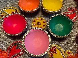 Decorating Clay Diwali Diyas In Preparation For The Diwali Festival