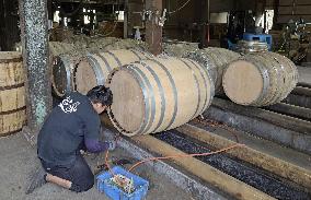 Liquor barrel-making in southwestern Japan