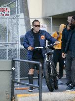 Arnold Schwarzenegger Rides A Bike - LA