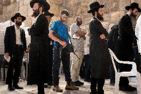 Jews Praying In The Western Wall In Jerusalem Amid The Ongoing War