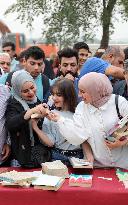 IRAQ-BAGHDAD-BOOK DISTRIBUTION FESTIVAL