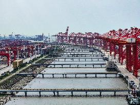 Taicang Zheng and International Wharf Approach Bridge