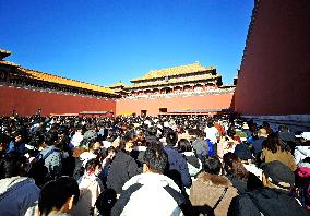 Tourists Visit The Forbidden City in Beijing