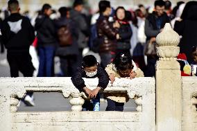 Tourists Visit The Forbidden City in Beijing