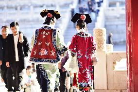 Tourists Visit The Forbidden City in Beijing