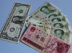Chinese Yuan and U.S. Dollars