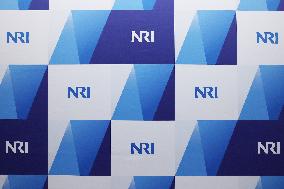 Nomura Research Institute signage and logo