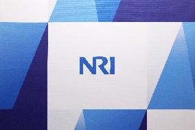 Nomura Research Institute signage and logo