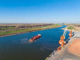 The First Large-scale Transportation in Xiaoqing River
