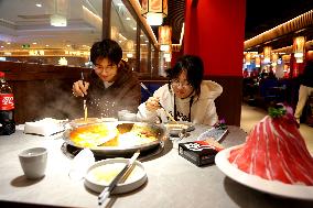 Consumers Eat Shabu at A Restaurant