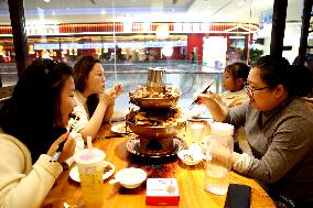 Consumers Eat Shabu at A Restaurant