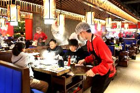 Consumers Eat Shabu at A Restaurant