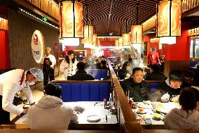 Consumers Eat Shabu at A Restaurant