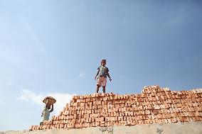 Laborers Work At A Brickyard - Bangladesh