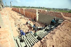 Laborers Work At A Brickyard - Bangladesh