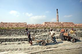 Laborers Work At A Brickyard - Bangladesh