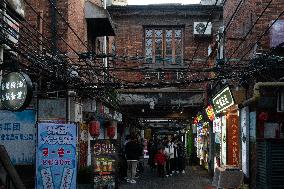 Tourists Visit Lane Street Tianzifang in Shanghai