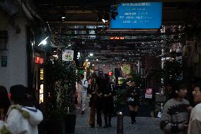 Tourists Visit Lane Street Tianzifang in Shanghai