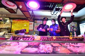 Law Enforcement Personnel Inspect Fresh Lamps in Lianyungang