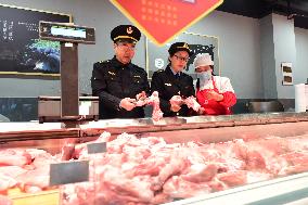 Law Enforcement Personnel Inspect Fresh Lamps in Lianyungang