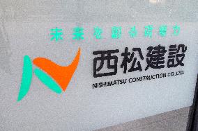 Signs and logos of Nishimatsu Construction Co.