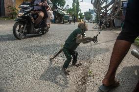 Street Monkey Mask Circus In Indonesia