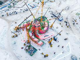 The 25th Harbin Ice and Snow World Under Construction in Harbin