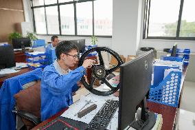CHINA-CHONGQING-MOTORCYCLE WHEEL HUB ENTERPRISES (CN)
