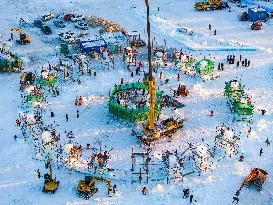 The 25th Harbin Ice and Snow World Under Construction in Harbin