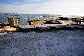 Repairing embankment at Lanzheron beach in Odesa after storm