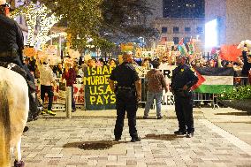 Pro-Palestinian Demonstration At City Hall Christmas Festival In Houston