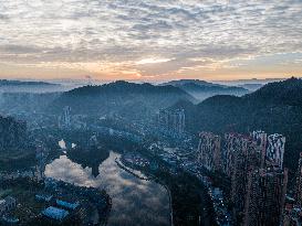 Buildings Loom in The Mist in Bijie