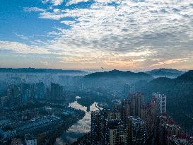 Buildings Loom in The Mist in Bijie