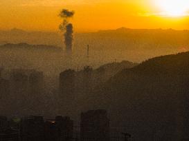 Buildings Loom in The Mist in Bijie