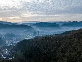 Buildings Loom in The Mist in Bijie