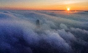 High-rise Buildings Shrouded in Mist