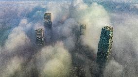 High-rise Buildings Shrouded in Mist