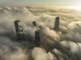 High-rise Buildings Shrouded in Mist