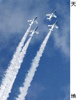 Blue Impulse aerobatic team flies over Okinawa