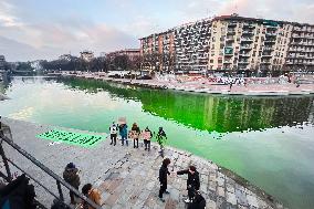 The Water Of The Darsena Colored Green By The Activists Of Extinction Rebellion In Milan
