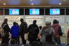 Parents Take Children to See A Doctor in Shanghai