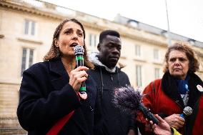 Rally In Paris Against Immigration Law As Parliamentary Debate Continues