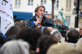 Rally In Paris Against Immigration Law As Parliamentary Debate Continues