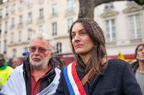 Rally In Paris Against Immigration Law As Parliamentary Debate Continues