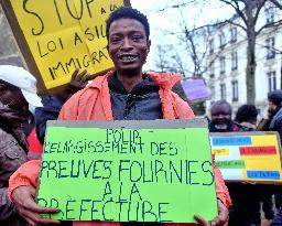 Rally In Paris Against Immigration Law As Parliamentary Debate Continues