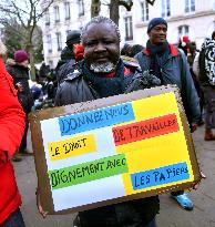 Rally In Paris Against Immigration Law As Parliamentary Debate Continues