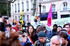 Rally In Paris Against Immigration Law As Parliamentary Debate Continues