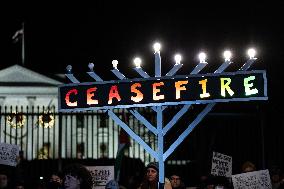 Jewish groups hold menorah lighting to call for a ceasefire in Gaza