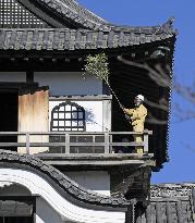 Year-end cleanup at central Japan castle